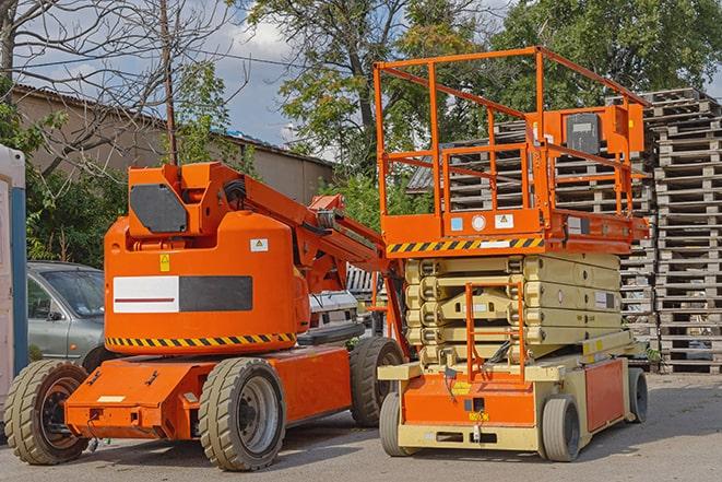 forklift moving crates in a large warehouse in Farmersville